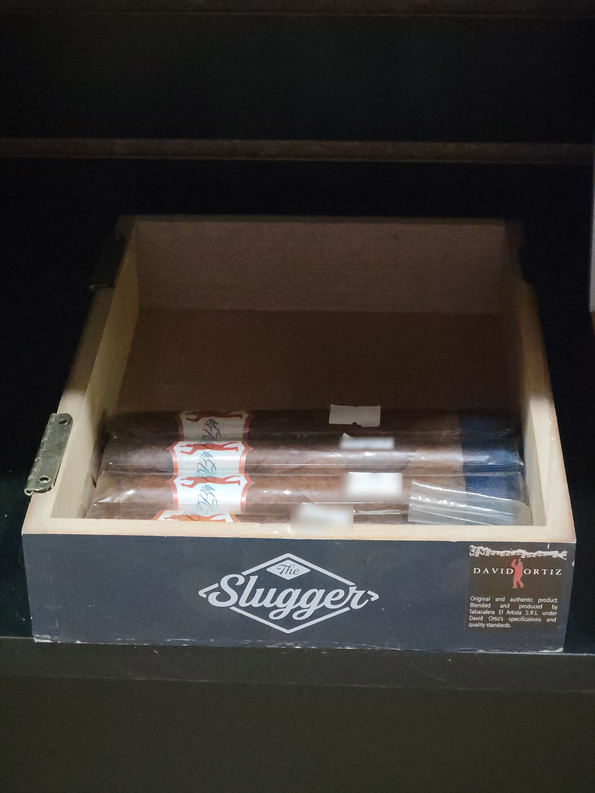 A Big Papi The Slugger box open on the shelf, The Slugger diamond on the front rail