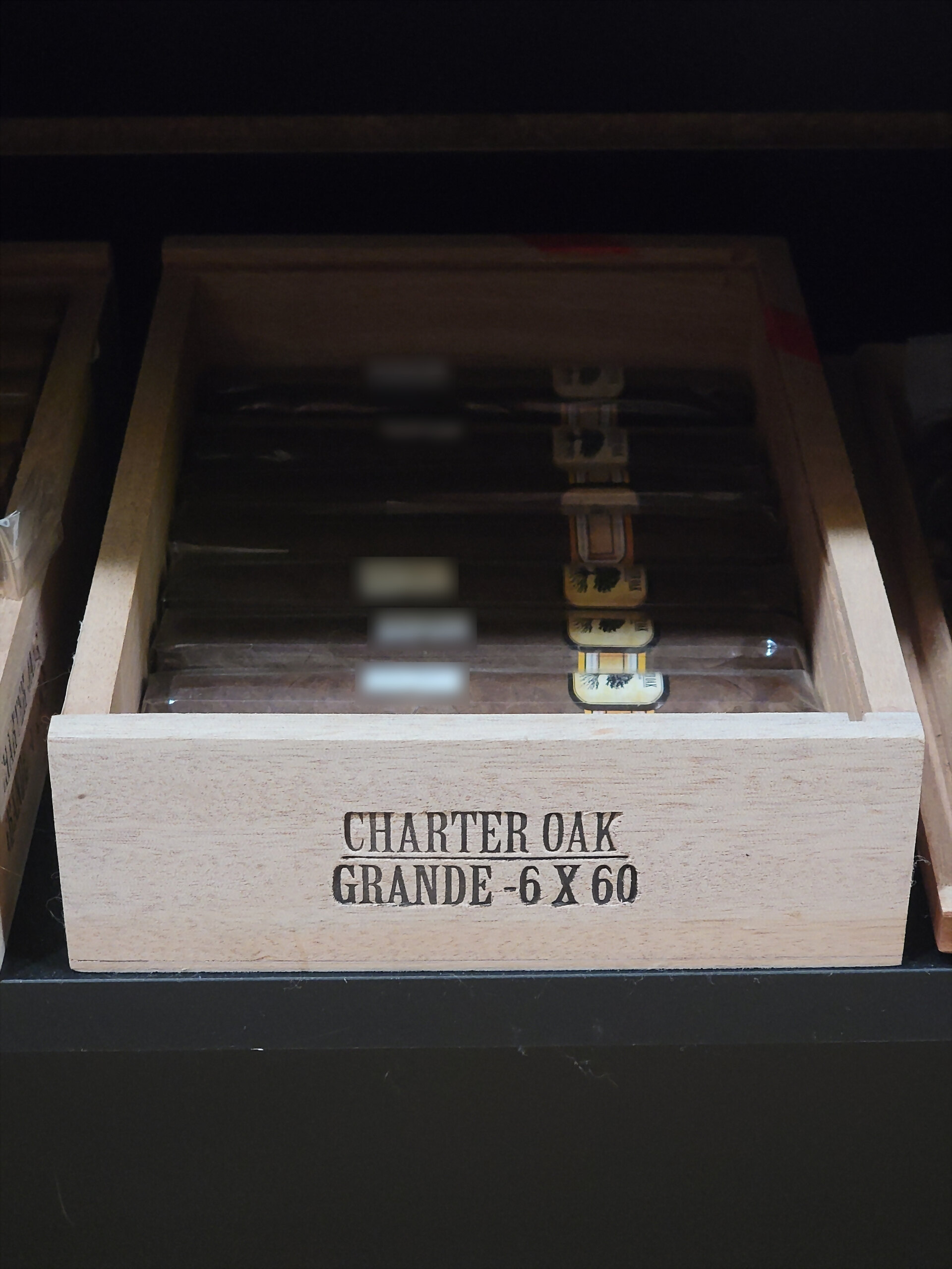 A Charter Oak box, GRANDE - 6 X 60 burned into the front rail