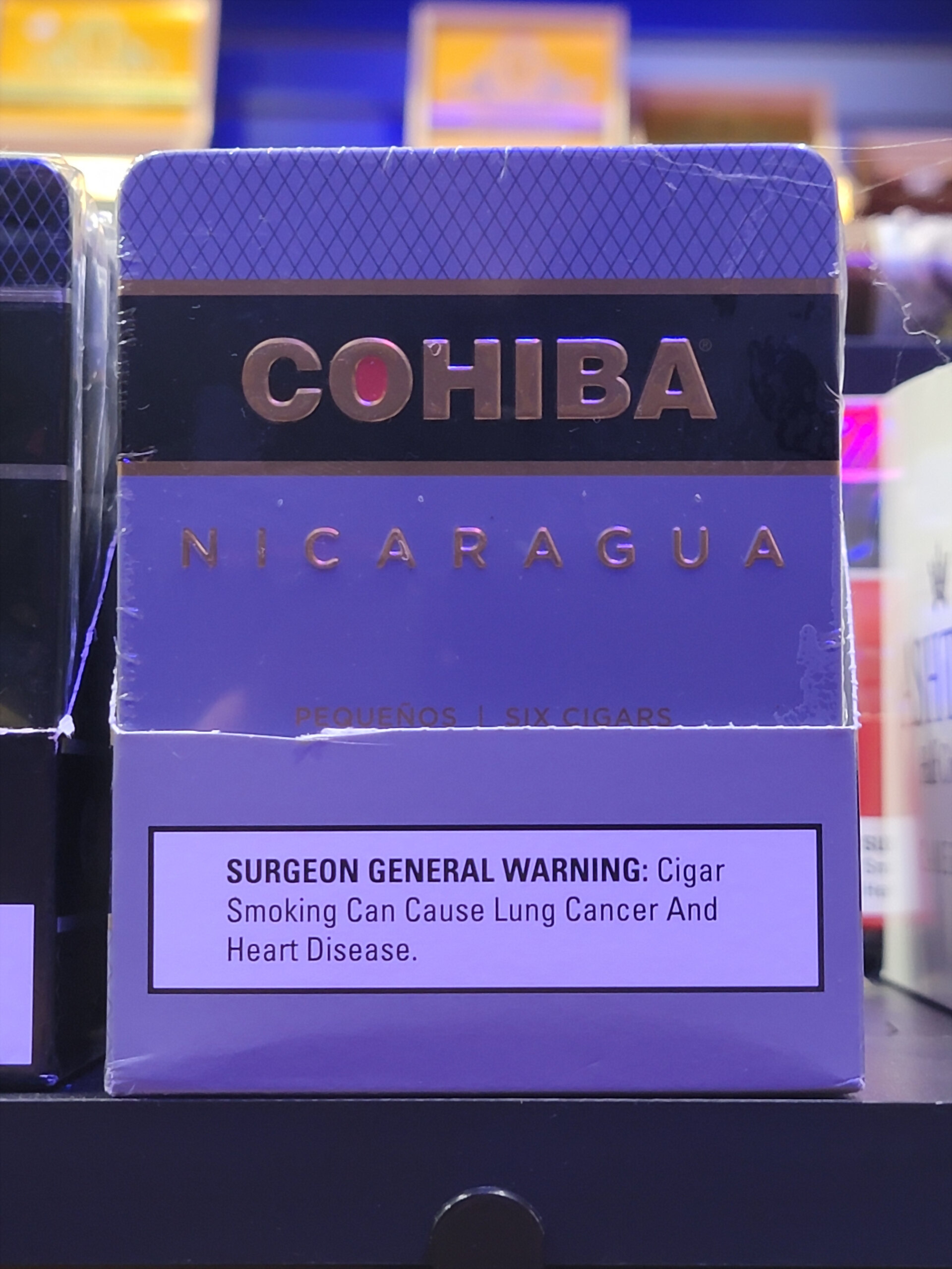 A Cohiba Nicaragua Pequeños carton on the counter display