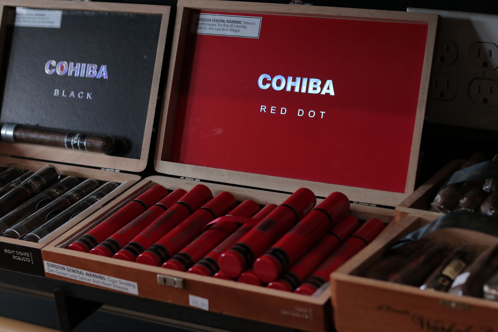 Cohiba Black cigar — Alongside the Red Dot