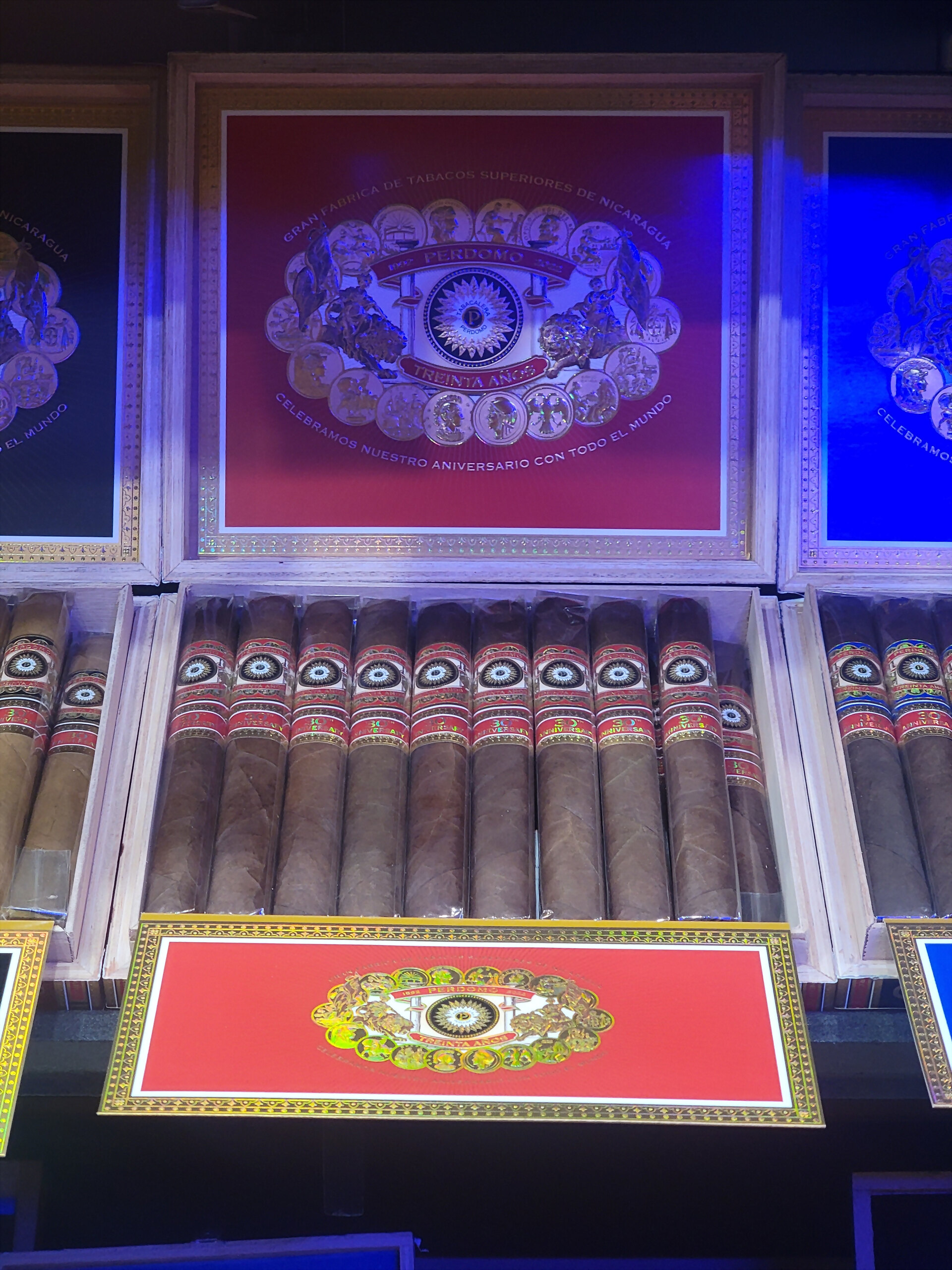 A second Perdomo Treinta Años box, the medallion on a red inner lid