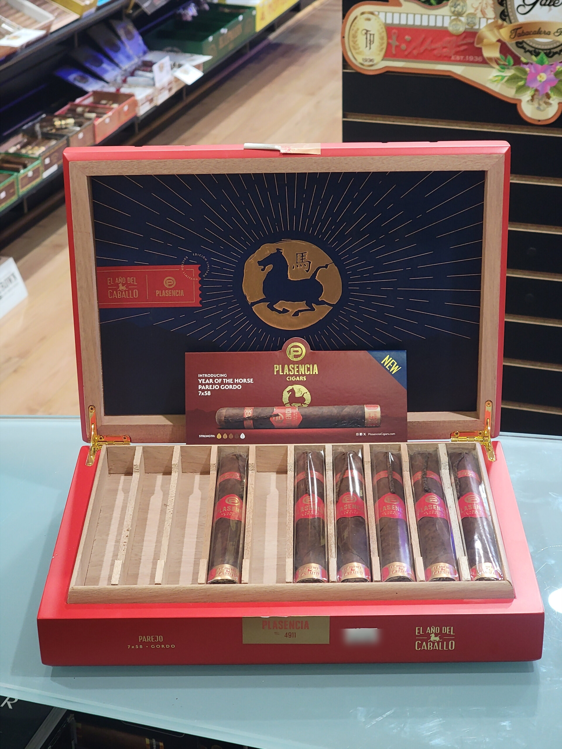 The El Año del Caballo box from above, red-banded cigars in their fitted tray