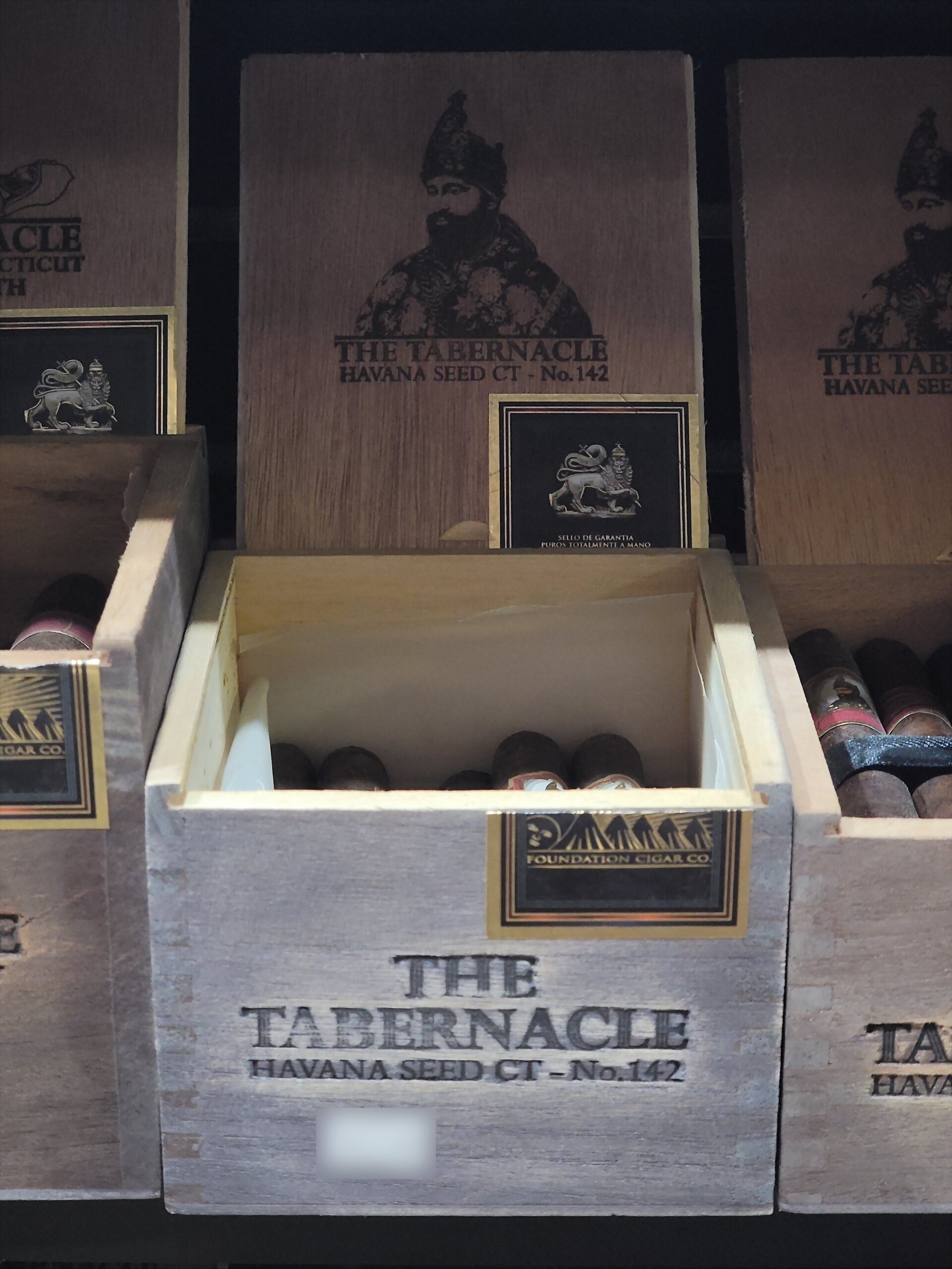 An open Tabernacle box with the Foundation Cigar Co. seal on the inner lid